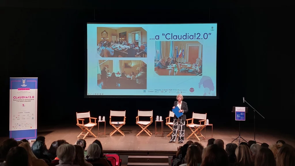 Palco evento Claudia 2.0, presentazione con foto