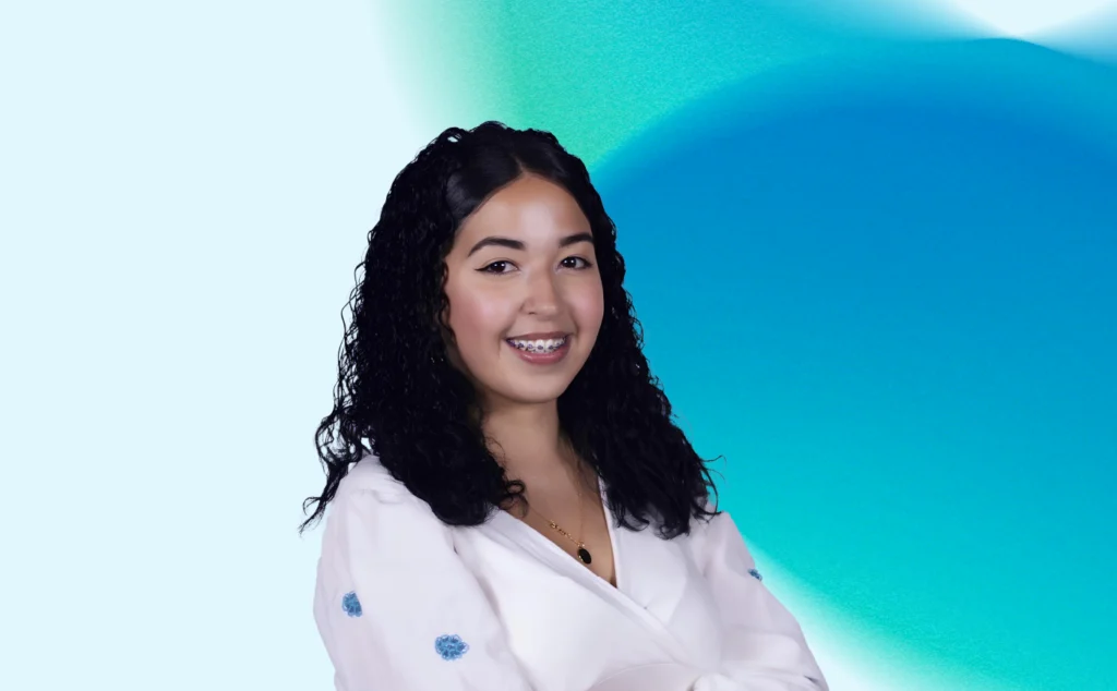 Rafaela Silva, a girl with white t shirt smiling at camera