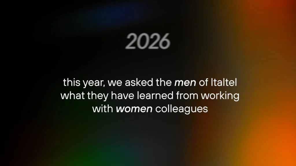 Text on a dark background with colorful edges reads: "2026. This year, we asked the men of Italtel what they have learned from working with women colleagues.